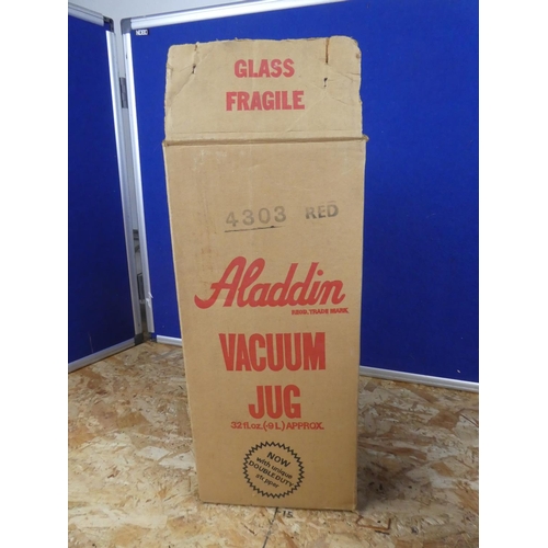 1250 - A vintage Aladdin water pitcher in original box.