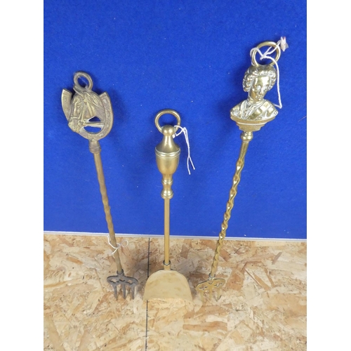 1255 - Two vintage brass toasting forks and a vintage brass shovel.