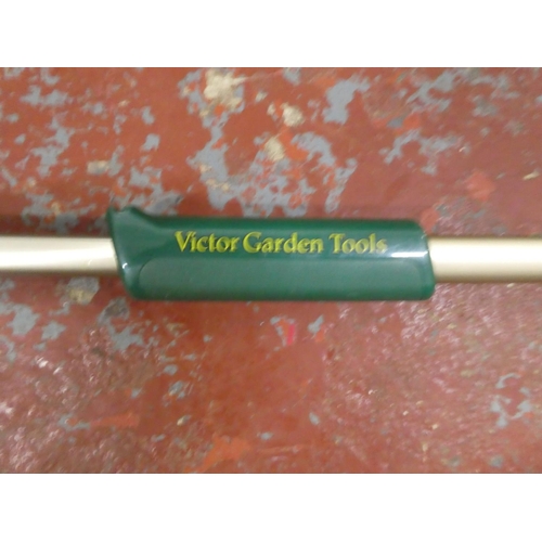 1270 - A Victor Garden Tools electric hedge clippers.