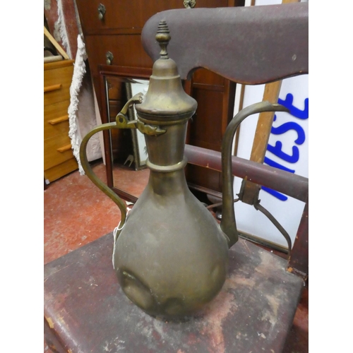 1277 - A vintage brass pitcher.