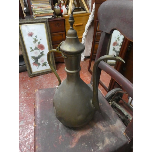 1277 - A vintage brass pitcher.