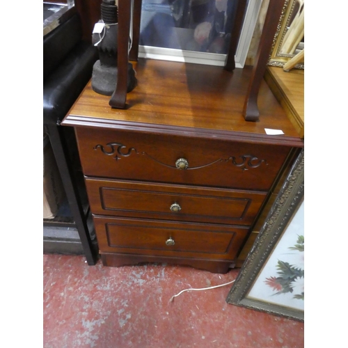 1285 - A three drawer Rossmore cabinet.