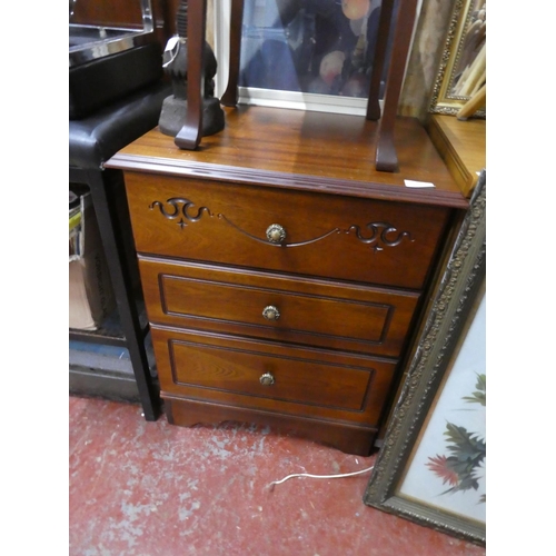 1285 - A three drawer Rossmore cabinet.