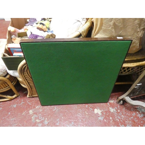 1306 - A folding card table with green felt top.