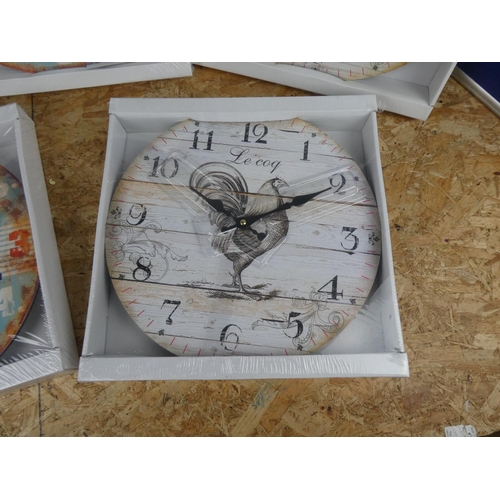 1320 - 5 new in box wall clocks.