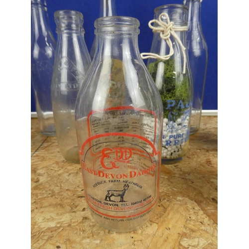 1330 - A collection of vintage milk bottles and more.