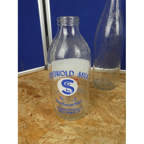 1330 - A collection of vintage milk bottles and more.