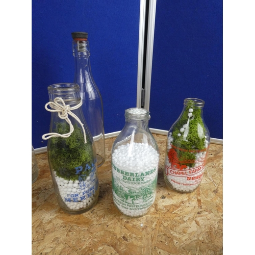 1330 - A collection of vintage milk bottles and more.