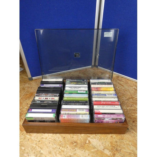 1342 - A vintage cassette  tape holder and a lot of various tapes.