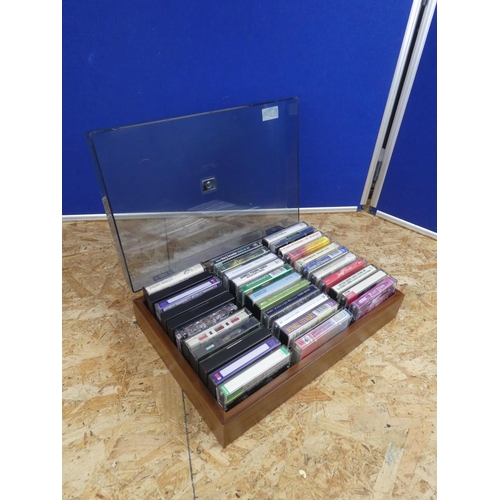 1342 - A vintage cassette  tape holder and a lot of various tapes.