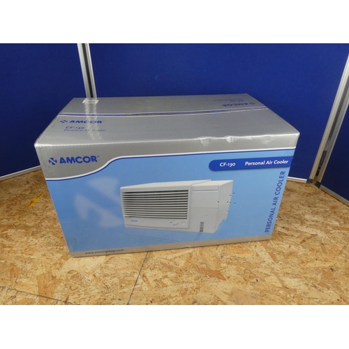 1353 - A boxed Amcor CF130 personal air cooler.