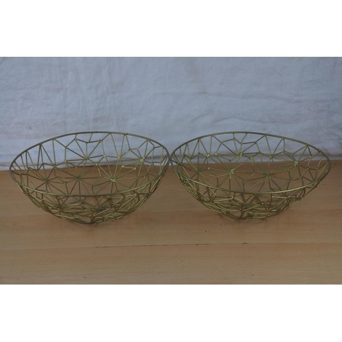 72 - Two wire baskets.