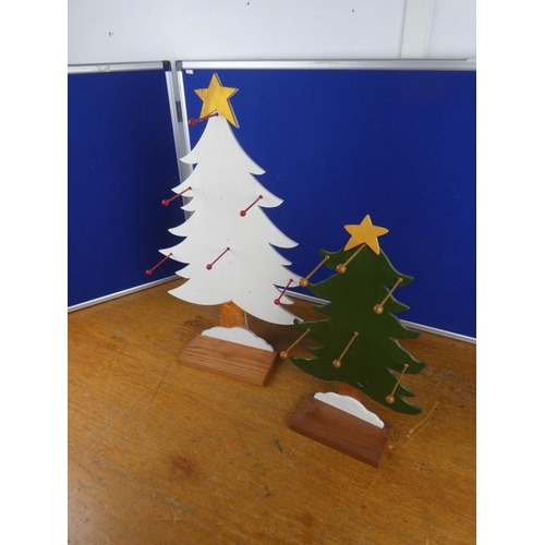 127 - Two wooden Christmas tree display stands.