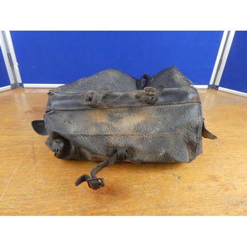 302 - A vintage leather satchel.