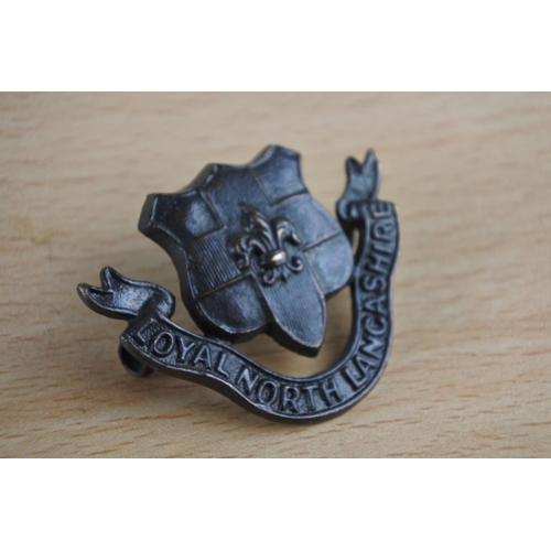 429 - A 'Loyal North Lancashire' cap badge