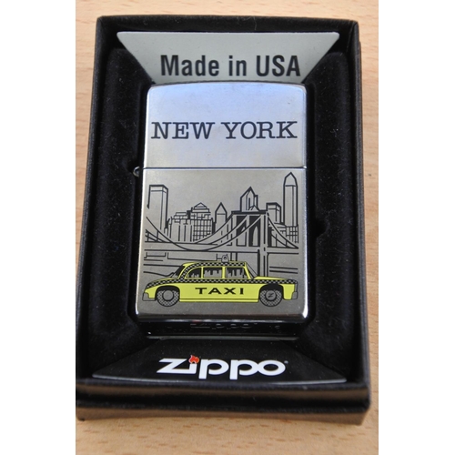 440 - A boxed Zippo New York Taxi lighter.