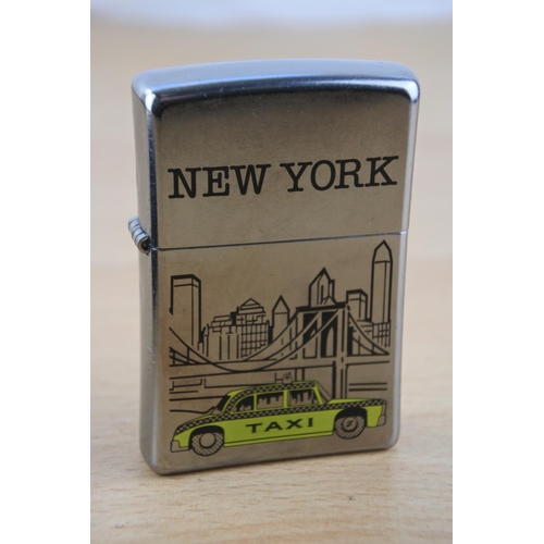 440 - A boxed Zippo New York Taxi lighter.