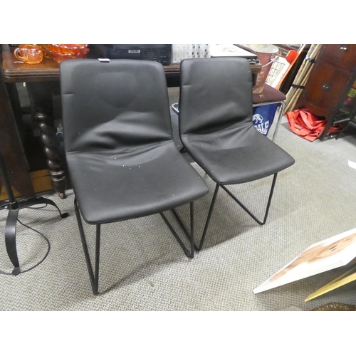 510 - A set of four dining room chairs on metal frames.