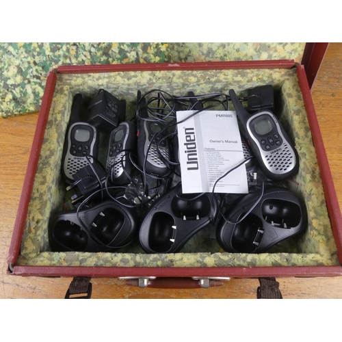 532 - A case set of six Uniden PMR885 walkie talkies and charging bases, with instruction manual.