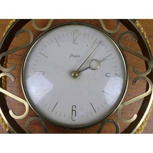 554 - A vintage Paico wall clock with rope detail.