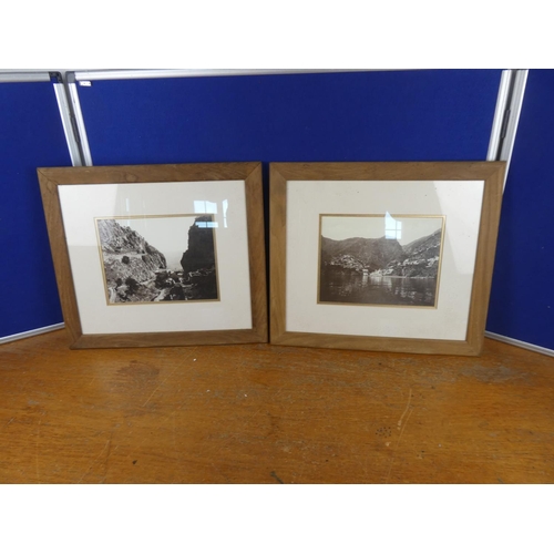 556 - A pair of oak framed photographs. Approx  35x40cm.