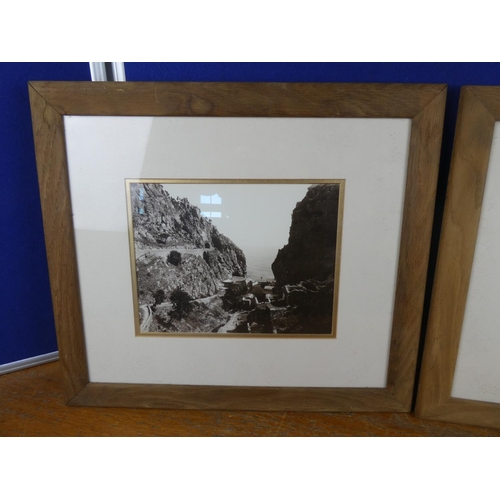 556 - A pair of oak framed photographs. Approx  35x40cm.