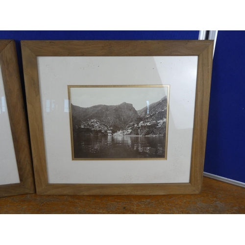 556 - A pair of oak framed photographs. Approx  35x40cm.