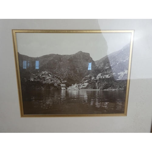 556 - A pair of oak framed photographs. Approx  35x40cm.