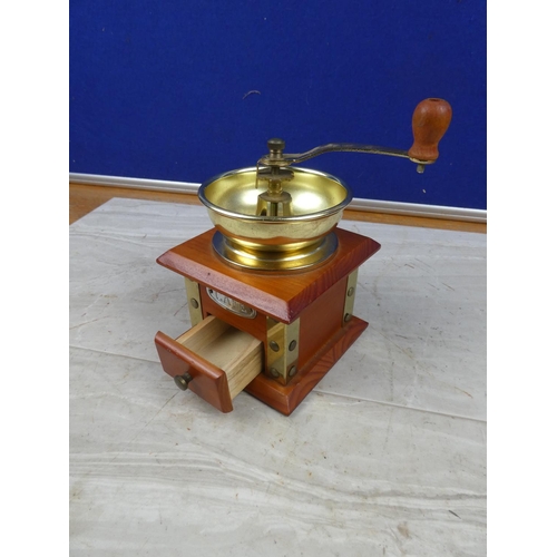 35 - A wooden cased coffee grinder.