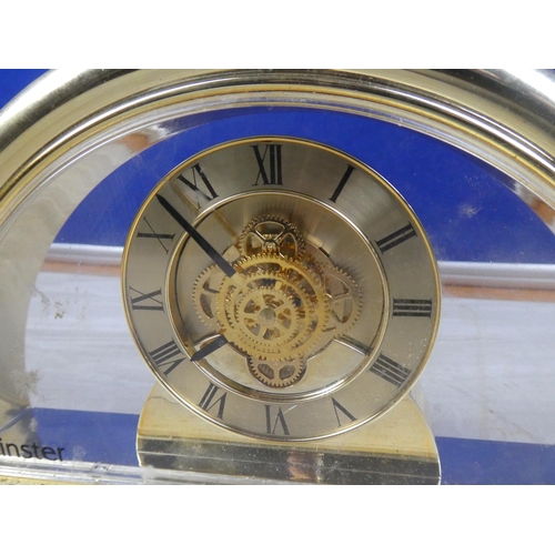 57 - A Minster skeleton style mantle clock.