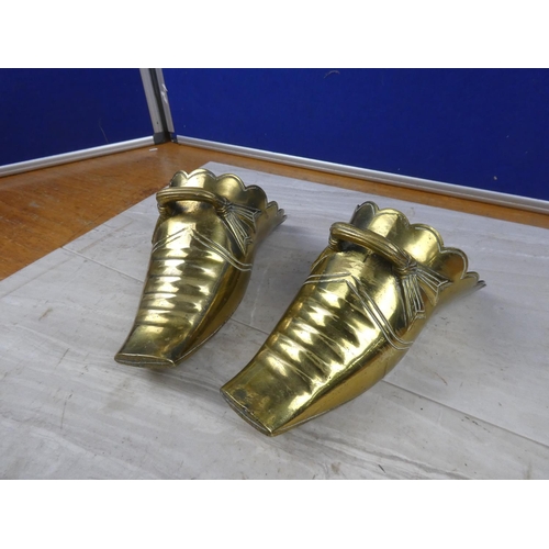 62 - A large pair of antique brass stirrups.