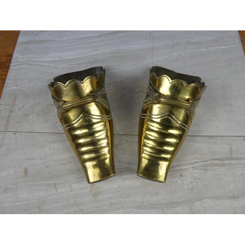 62 - A large pair of antique brass stirrups.