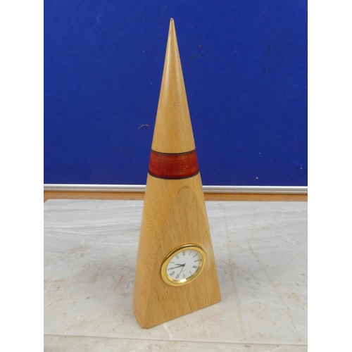 65 - A wooden cased  quartz mantle clock.