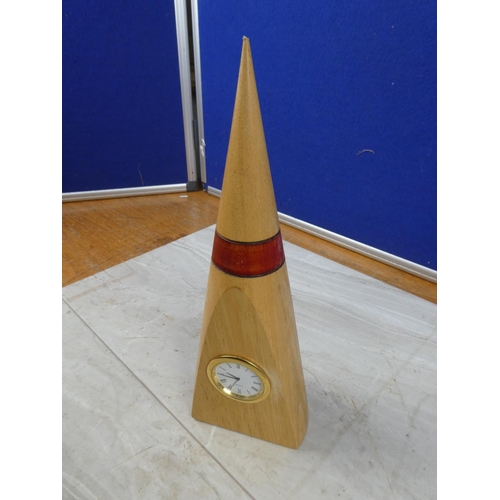 65 - A wooden cased  quartz mantle clock.