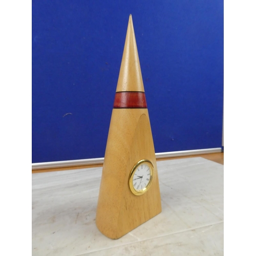 65 - A wooden cased  quartz mantle clock.