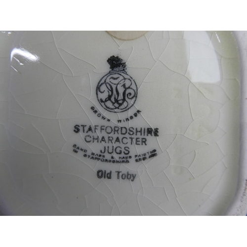 68 - An 'Old Toby' staffordshire jug.