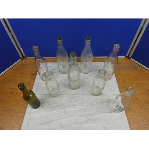 7 - A collection of antique and vintage milk bottles and more to include H S Hezlett Liffock Dairy, Broc... 