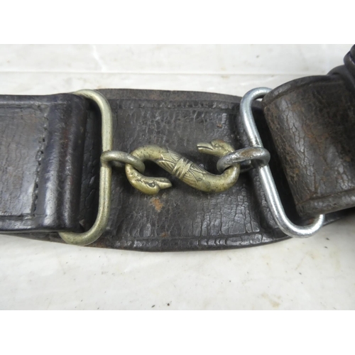 77 - An antique Royal Ulster Constabulary/ Royal Irish Constabulary belt & pistol holster.