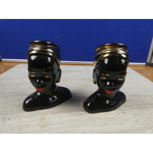 81 - A pair of vintage ornamental head vases.