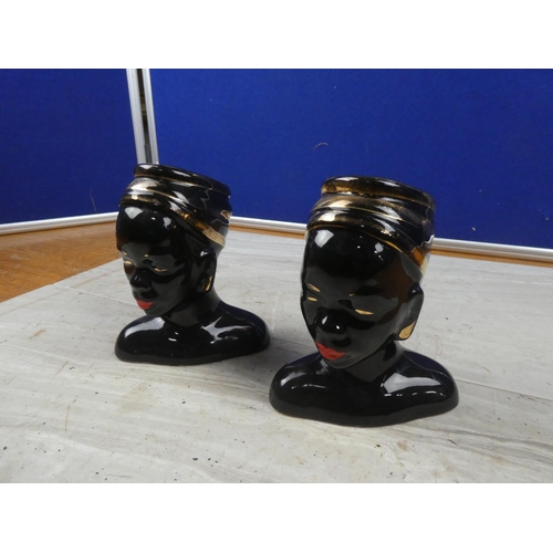 81 - A pair of vintage ornamental head vases.