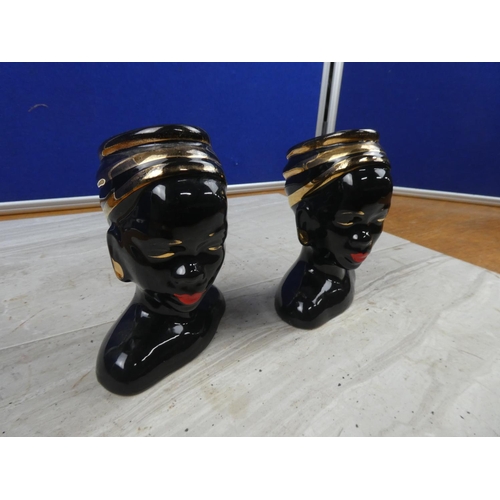 81 - A pair of vintage ornamental head vases.