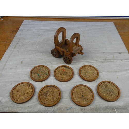 87 - A wooden souvenir cart and coasters from Carrigart.