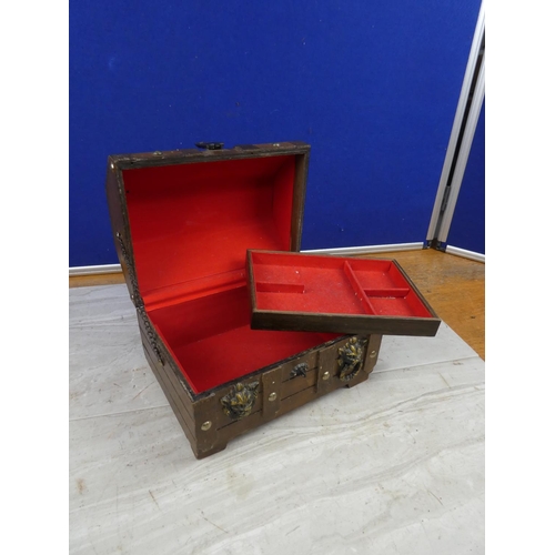 9 - A wooden jewellery box in the style of a chest (a/f).