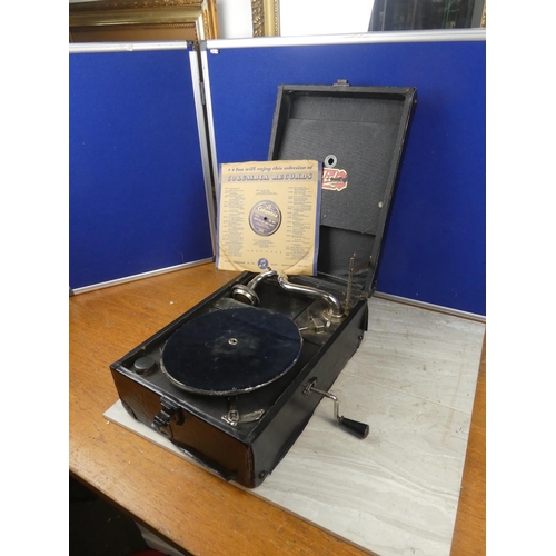 585 - A vintage cased gramophone.