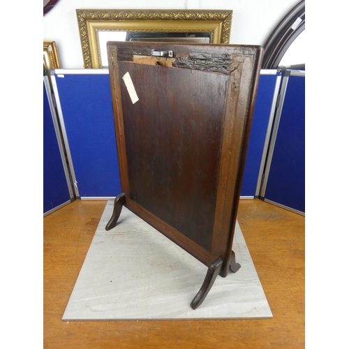 591 - A vintage oak framed firescreen with a tapestry panel. approx 68x53cm.