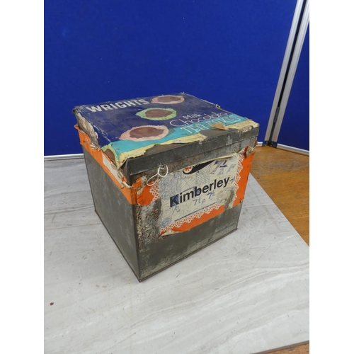 594 - A vintage metal storage tin.