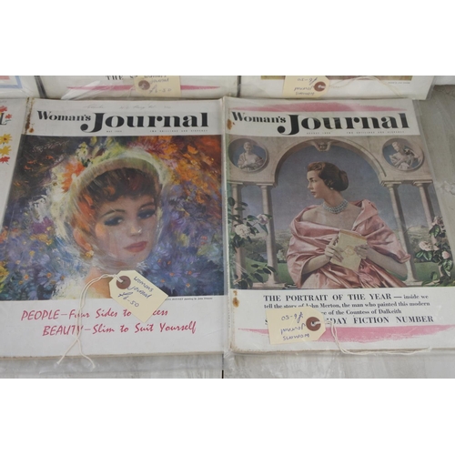 610 - Seven Woman's Journal magazines.