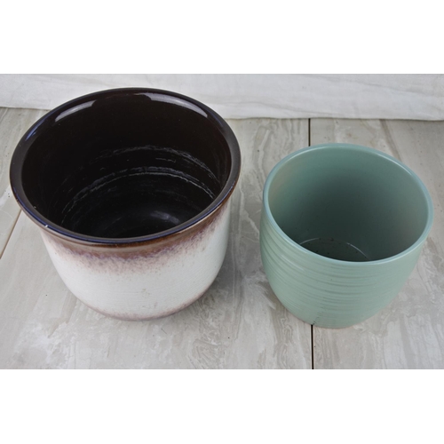 616 - A vintage West German pottery plant pot and another.
