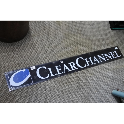 641 - A vintage 'Clear Channel' metal advertising sign. Approx 124x15cm.