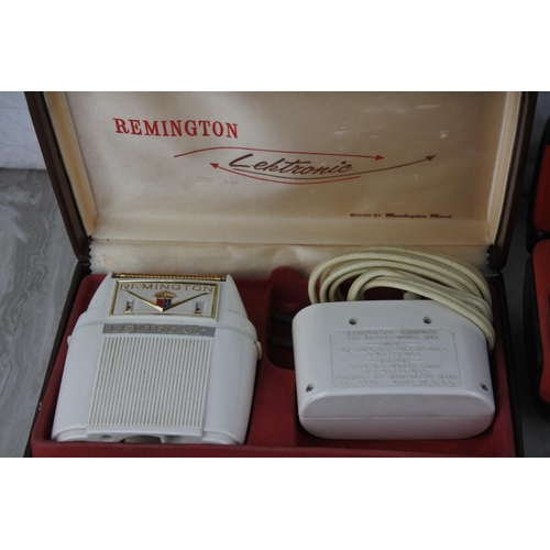 657 - A boxed vintage Remington Lektronic shaver and more.